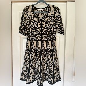 Sandra Darrin, black and cream fit and flare knit dress. Sz large